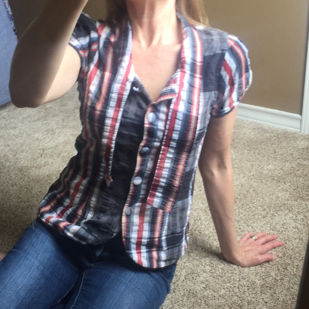 Plaid top with fabric covered front buttons and pleated cap sleeves